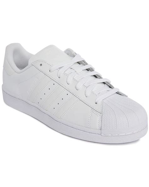 classic white adidas sneakers.